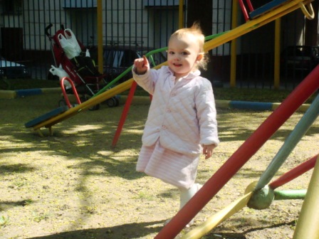 April2008/playing_at_the_playground_outside_our_building.JPG