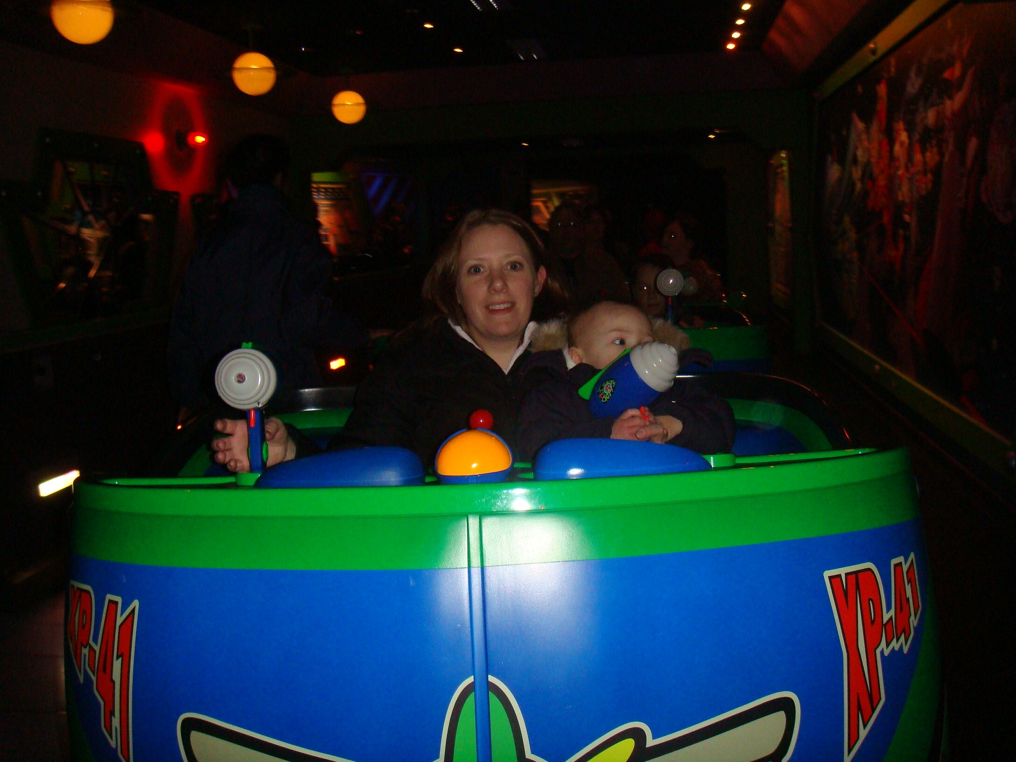 DisneyParis/Paris_658Mom_and_Megan_on_Buzzlightyear_lazer_blast.JPG