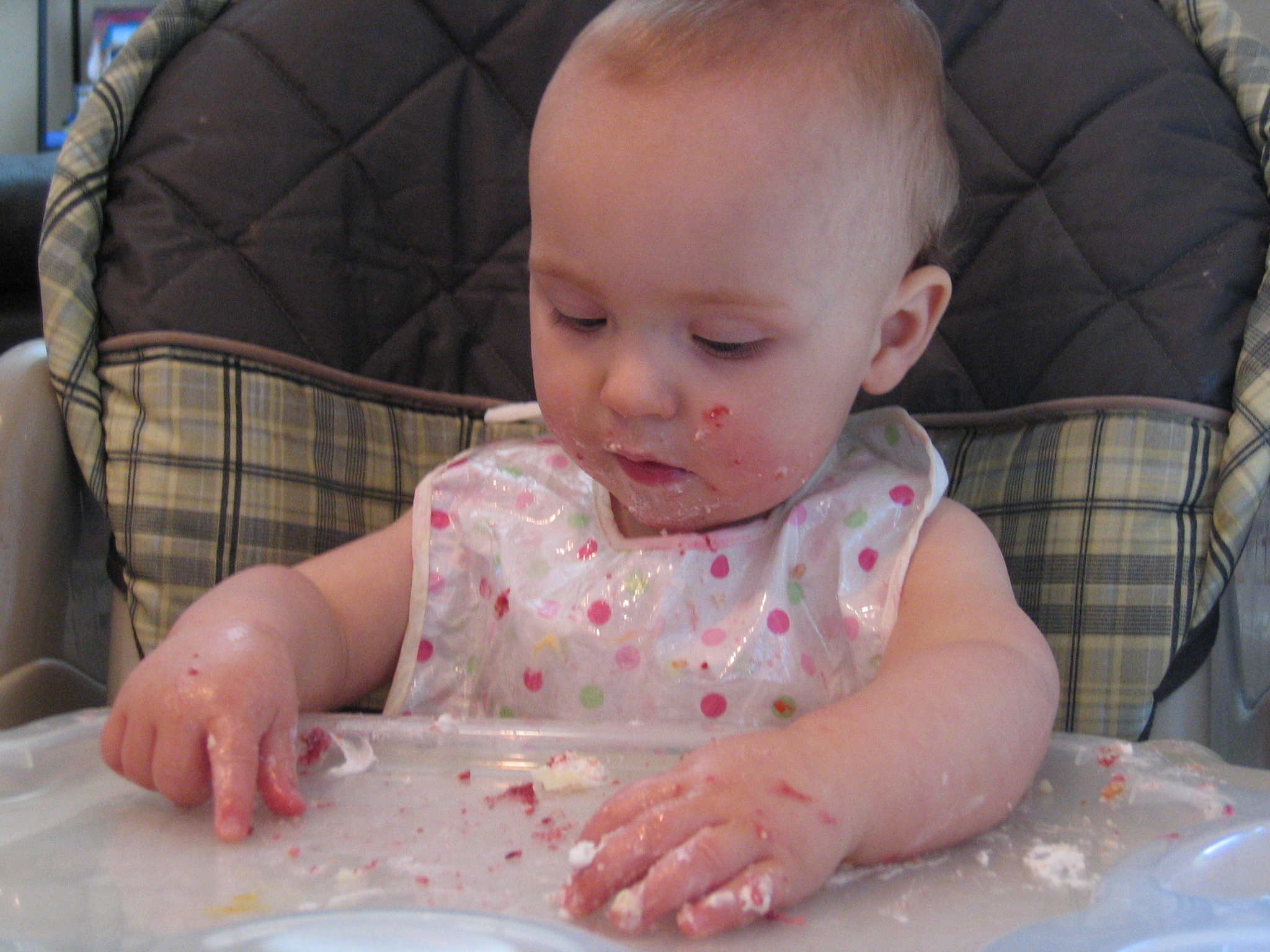 Megans1stbday/15_Megan_eating_birthday_cake.jpg