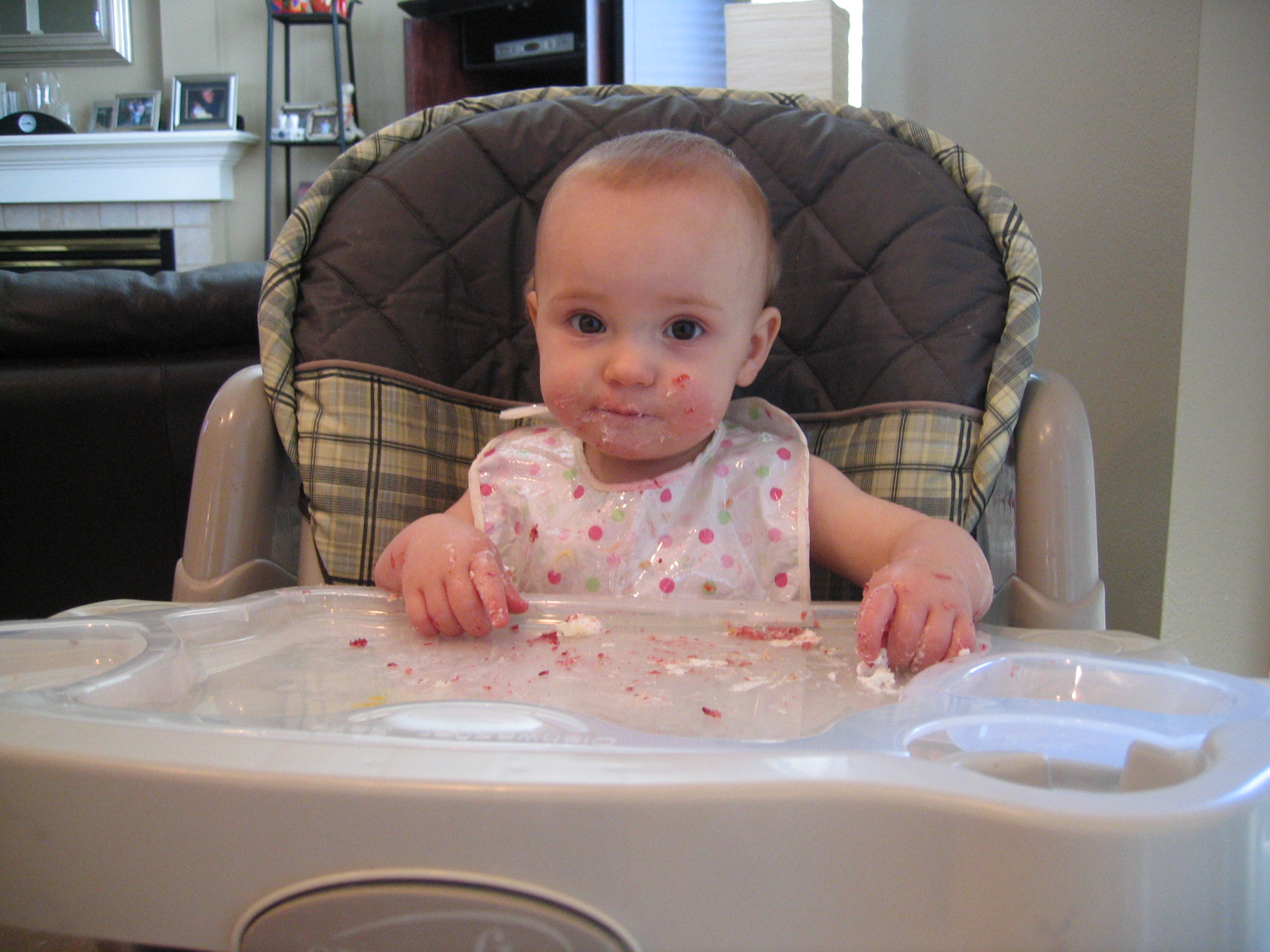 Megans1stbday/17__Megan_eating_birthday_cake.jpg