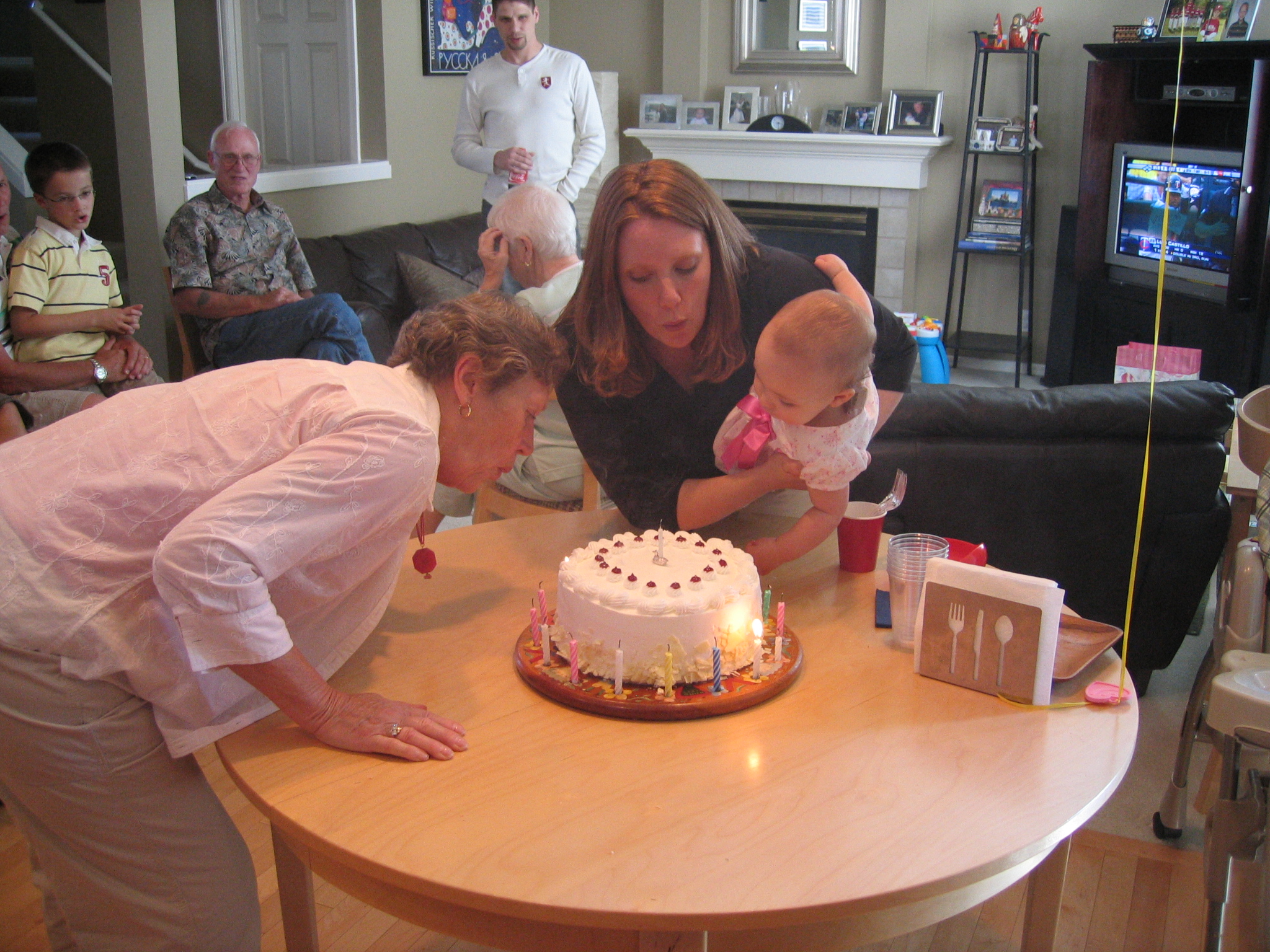 Megans1stbday/20_the_two_birthday_girls_blowing_out_their_candles.jpg