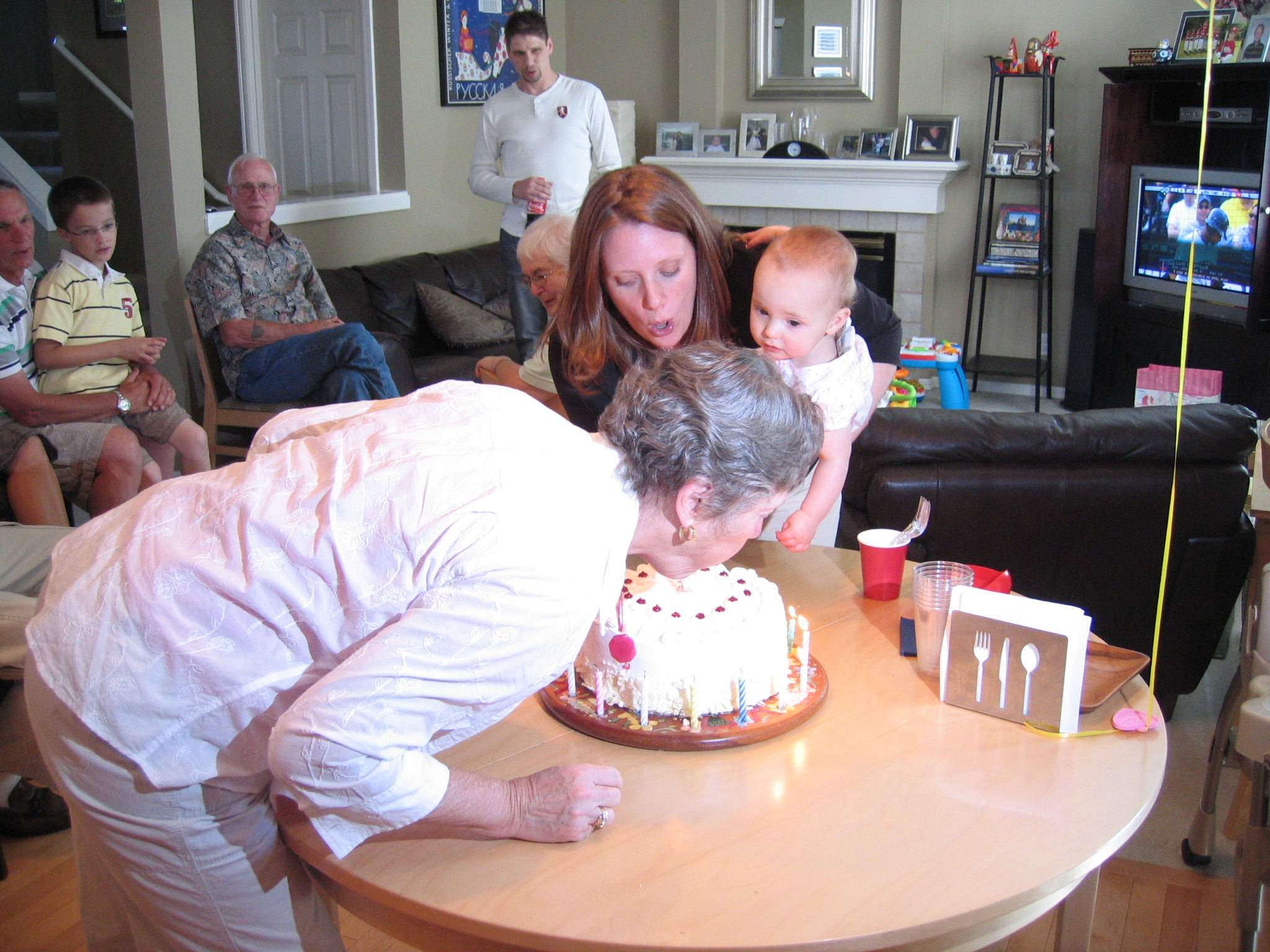 Megans1stbday/21_the_two_birthday_girls_blowing_out_their_candles.jpg
