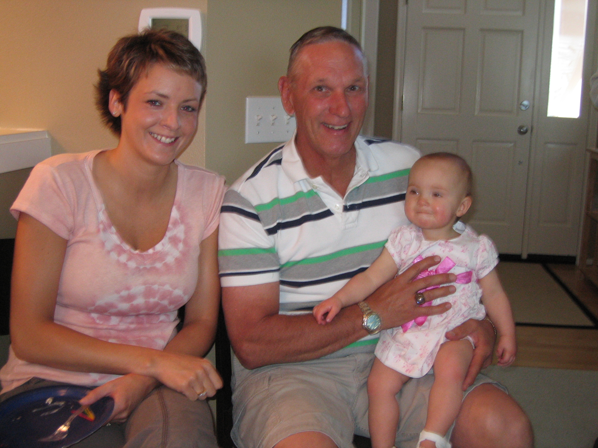 Megans1stbday/34_Sarah__Grandpa_Ken_and_Megan.jpg