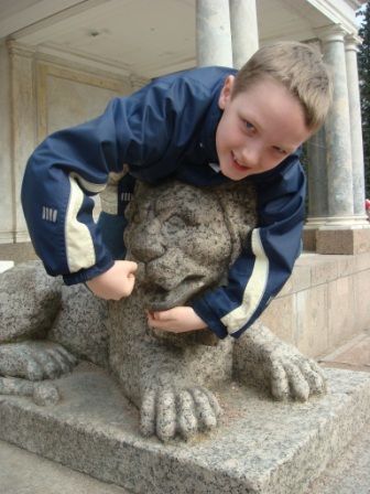 Peterhof/334Riley_on_a_lion_in_the_Lower_Park__Peterhof.JPG