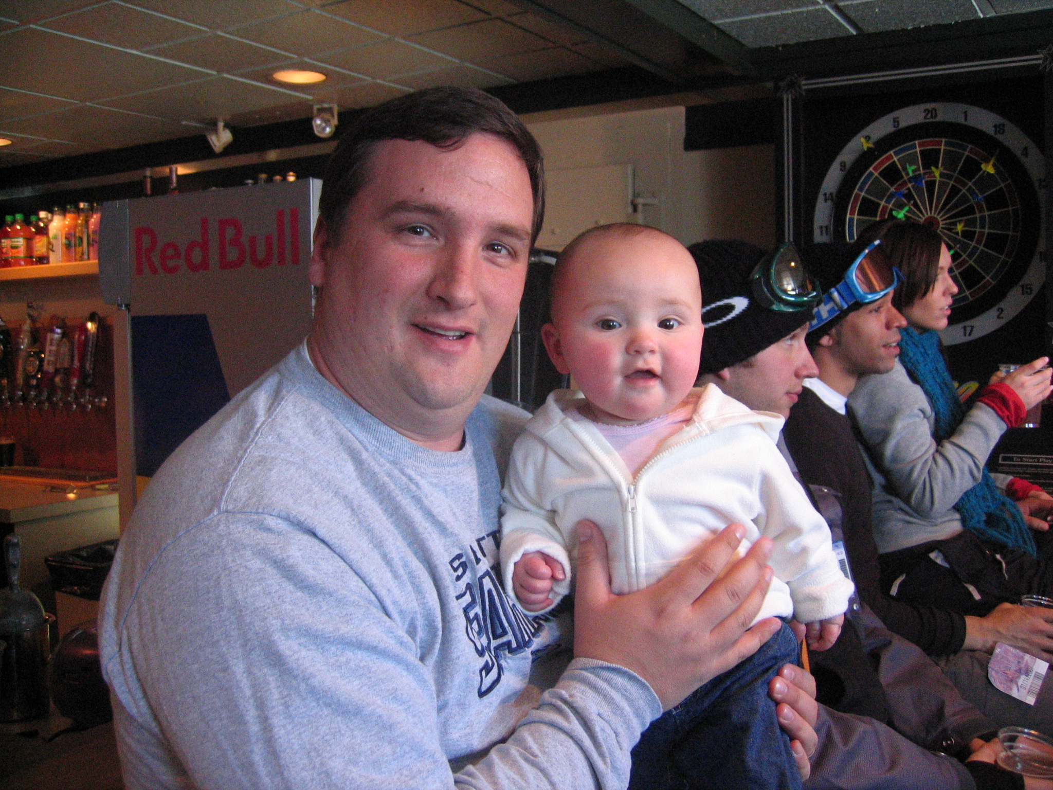 Rileyskiing/02_Daddy_with_Megan_at_her_first_bar___Snoqualmie_Central_watching_Seahawks_playoff_game.jpg