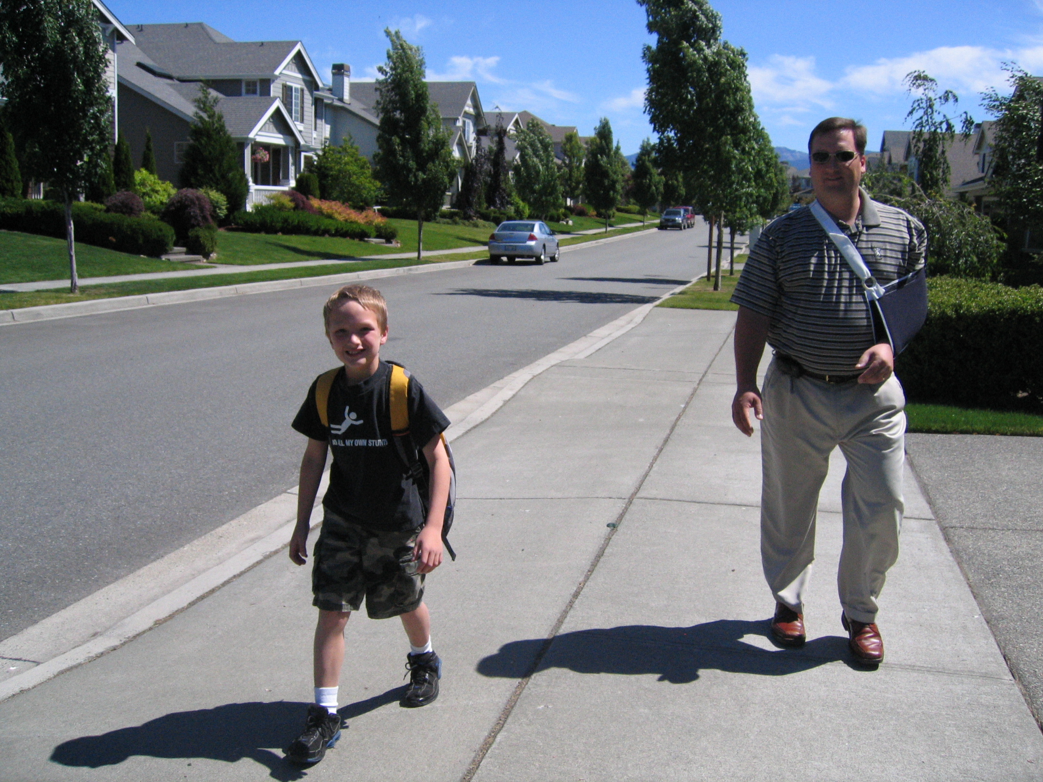 june2007/Riley_walking_home_with_daddy_on_his_last_day_of_2nd_grade.jpg